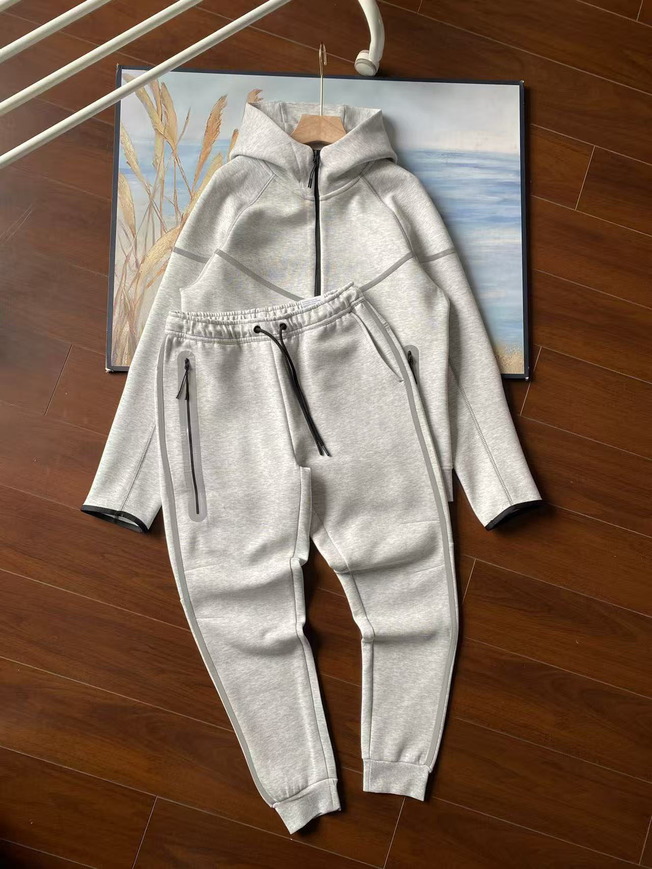 25 años de nuevo chaqueta deportiva encapuchada chaqueta de aire capa de algodón chaqueta con cremallera chaqueta de estampado reflectante otoño conjunto de chaqueta