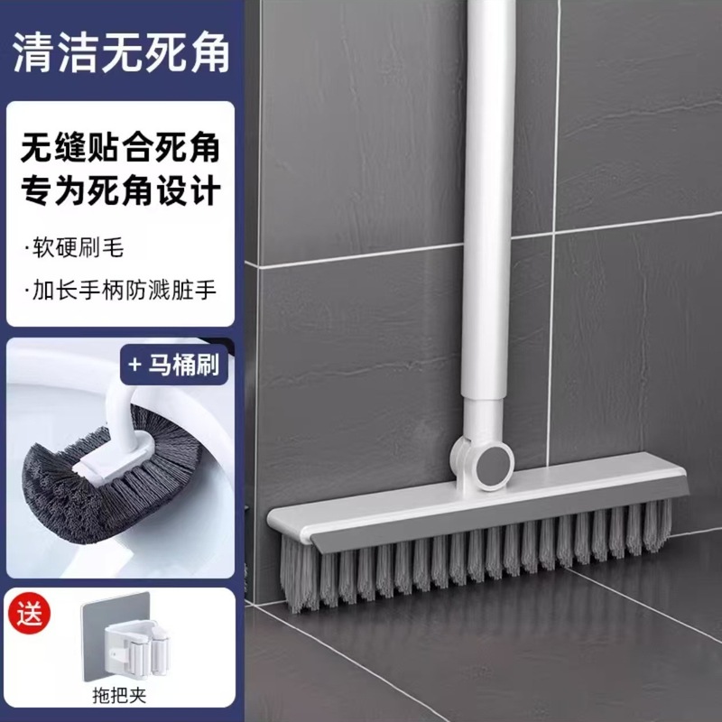 床ブラシトイレの長い柄の床ブラシの隙間の浴室の壁をきれいにして浴室のタイルを洗います。|undefined