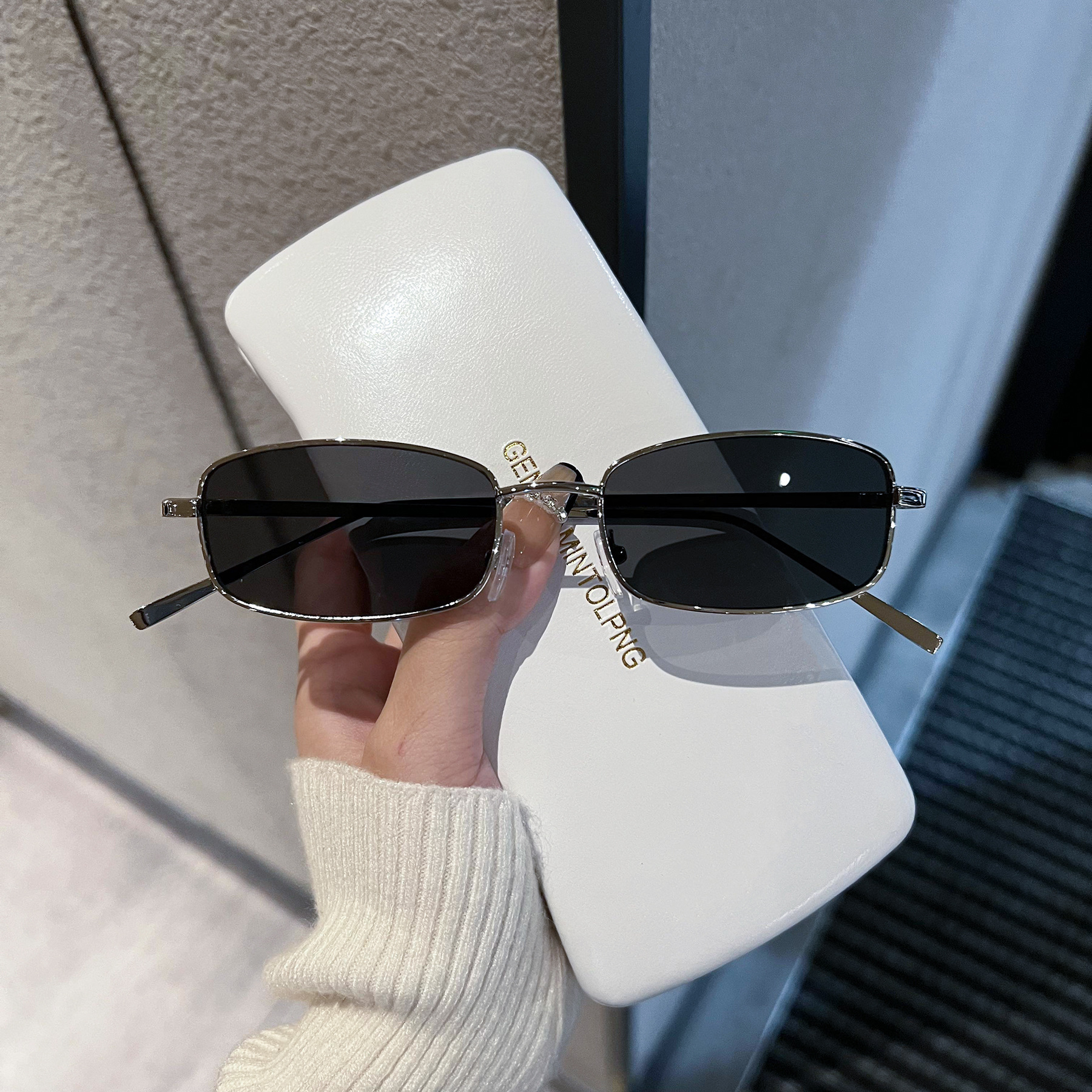 Silver frame gray film