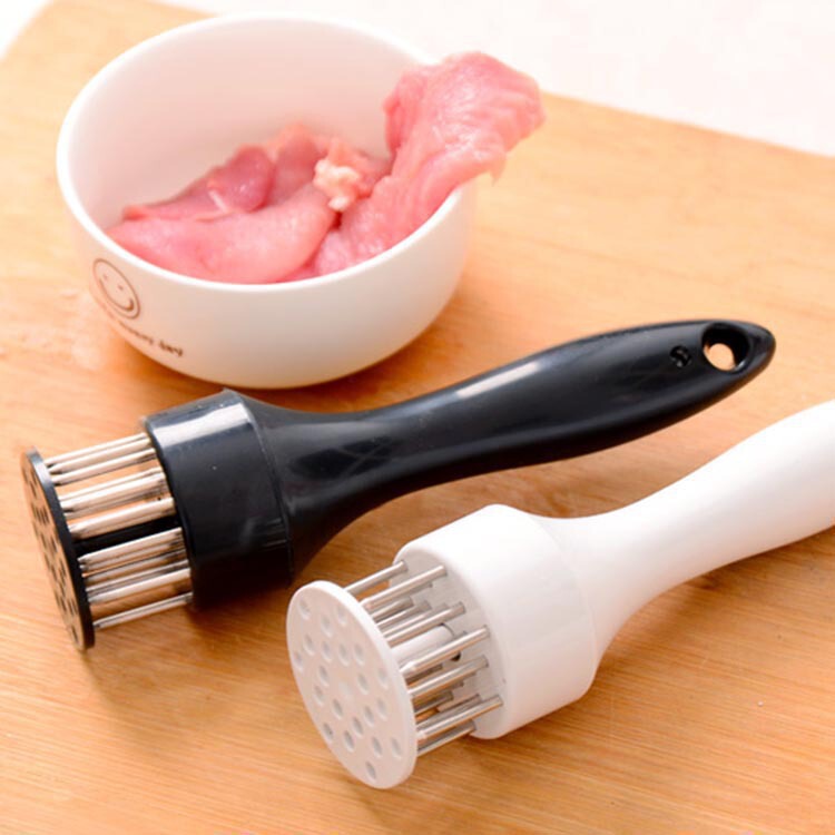 ステンレスの松肉の針の松肉の器は豚の皮の豚肉を打ってハンマーの肉を挿します。|undefined