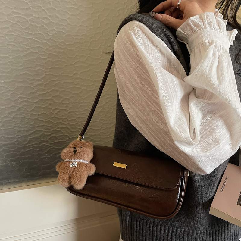 Nicho transfronterizo bolso de palo para mujeres 2025 nueva moda versátil bolso de hombro de brazo de alta calidad bolso de viaje portátil