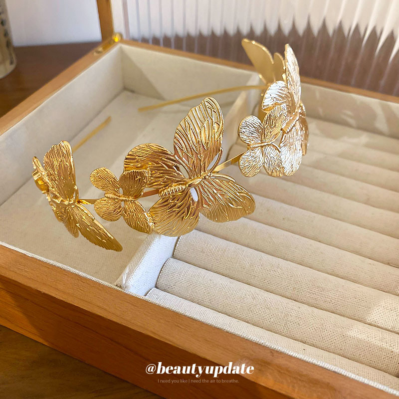Diadema de metal de mariposa, diadema de presión superior de alta cabeza simple de moda, sentido de alta calidad, personalidad, todo fósforo, nuevos accesorios para el cabello al por mayor