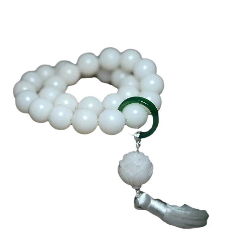 Бодхи- Defines: rosary with tassels?