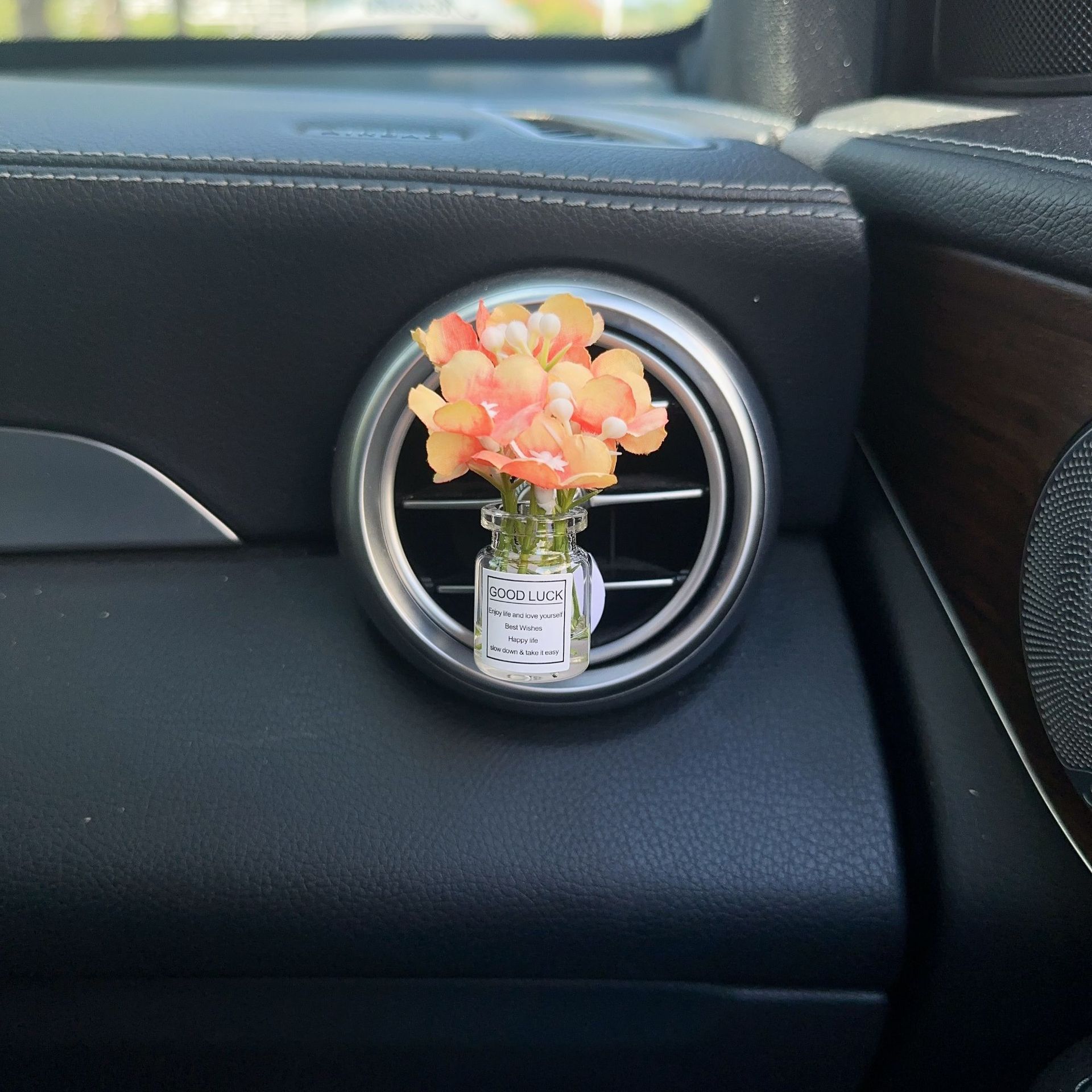 Decoración creativa de salida de aire del automóvil con flores de estrellas pequeñas frescas aire acondicionado botella de perfume de perfumes