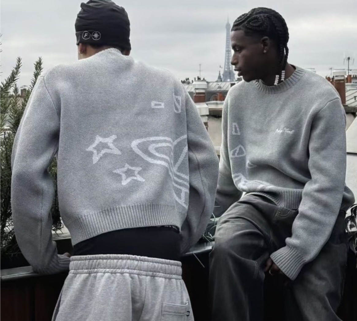 Europa y América bordado Jacquard transfronterizo estilo de moda de estilo callejero estilo americano camisa de punto simple suéter de cuello redondo