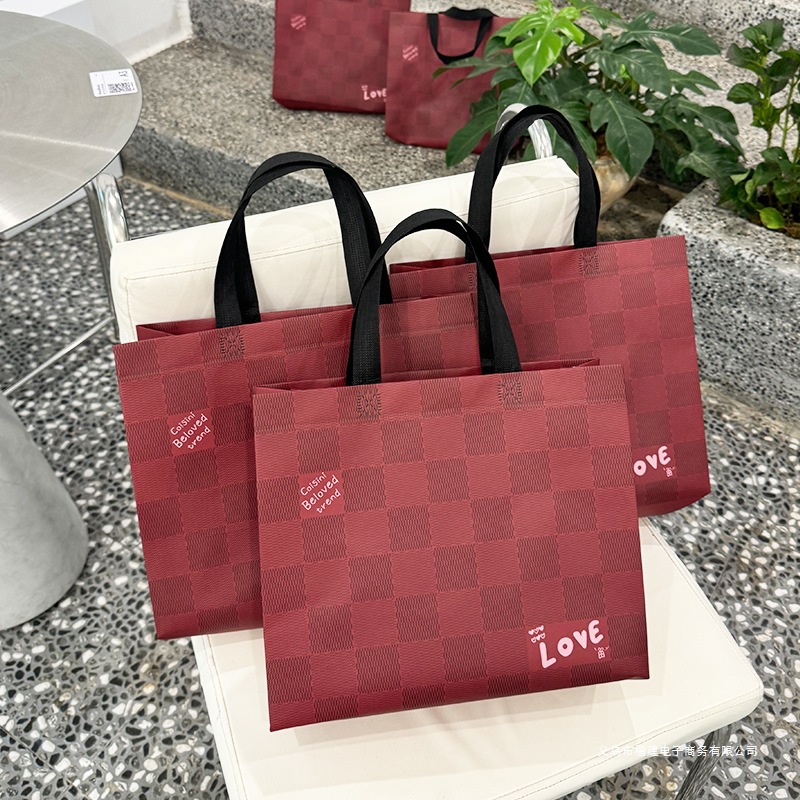 服装店衣服打包袋子女装手提袋红色礼品袋无纺布购物袋制作