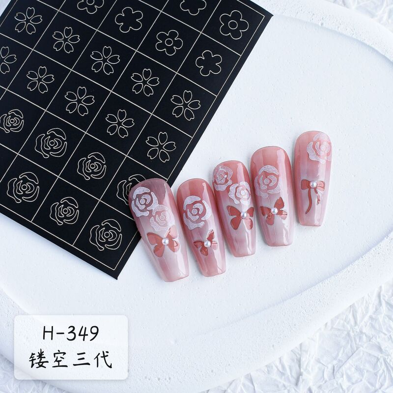 ネイル用品の透かし彫りのネイルアートのスプレーのテンプレートのステッカーの3世代のステッカーの透かし彫りの蝶の愛の爪のステッカーの卸売り|undefined