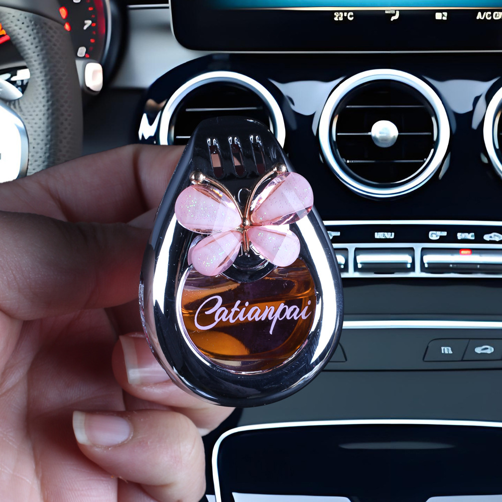 Aromaterapia para coche 2025 nuevo perfume de coche con lazo de fragancia de larga duración, adornos para coche, plástico de fragancia ligera de larga duración