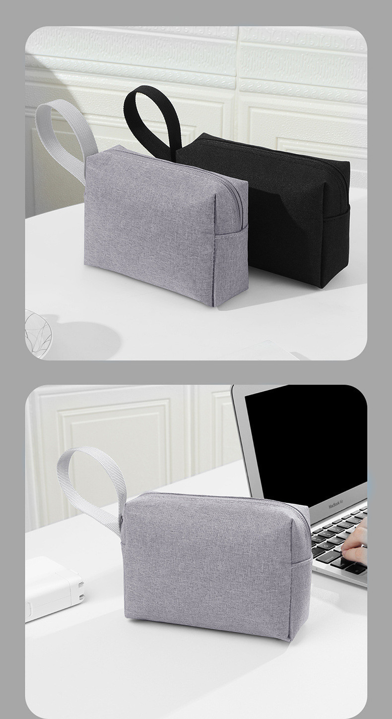 Cross-border in-stock hand-held toiletry bag 300D cationic waterproof cosmetic bag Oxford cloth storage notebook power bag undefined