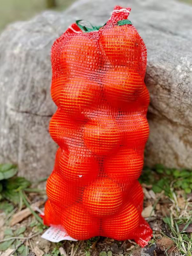 Naranja en bolsa de malla, naranja en bolsa de malla, pomelo en bolsa de malla, sandía en paquete, cebolla, patata, cuerda, bolsa de pollo