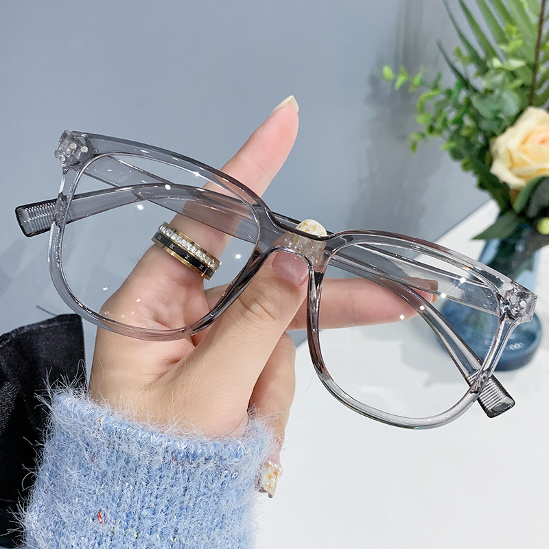Nuevo Marco de uñas de color beige gafas de luz anti-azul artefacto de belleza liso marco grande que adelgaza versátiles hombres y mujeres gafas de luz anti-azul