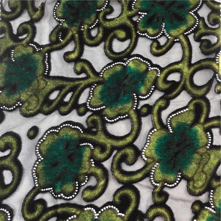 厂家供应锦绒梭织镂空印烂花植绒花朵烂花布女装