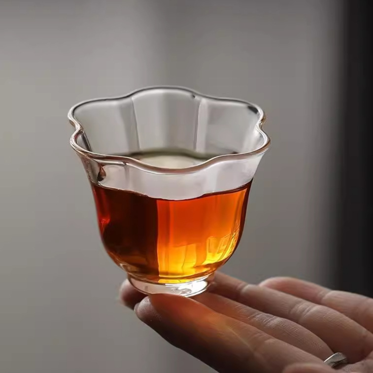 Transparent glass tea cup
