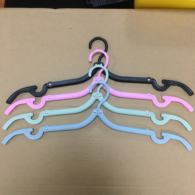 Percha plegable de viaje engrosada para el hogar multifunción de viaje portátil plástico mágico disponible para estudiantes