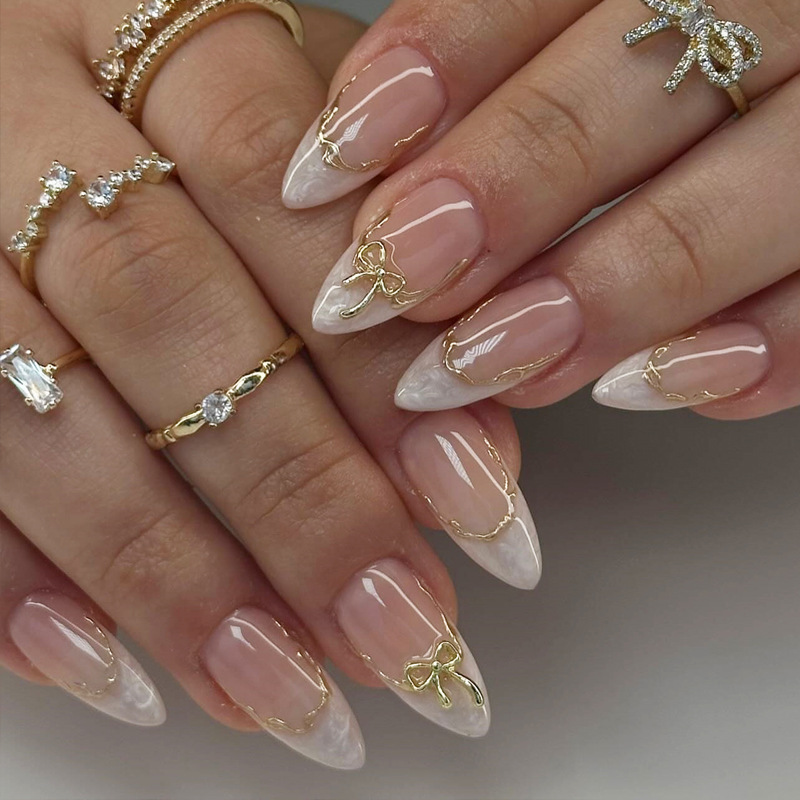 Cross-Border Wearable Nails Gentle French Nude Pink Marble Pattern Gold Bow Almond-Shaped Women's Fake Nails Wholesale Cross-Border Wearable Nails Gentle French Nude Pink Marble Pattern Gold Bow Almond-Shaped Women's Fake Nails Wholesale