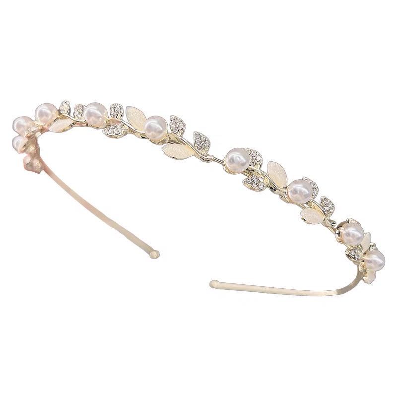 Accesorios para el cabello de alto sentido femenino Socialite nicho súper Hada temperamento diadema dulce ojo de gato perla diadema accesorios para el cabello francés