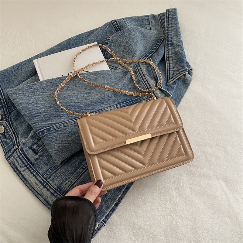 Este año, la nueva tendencia de alta calidad de la cadena de diamante, bolsos cuadrados, bolsos de moda de hombro simple, bolsos de mujer.
