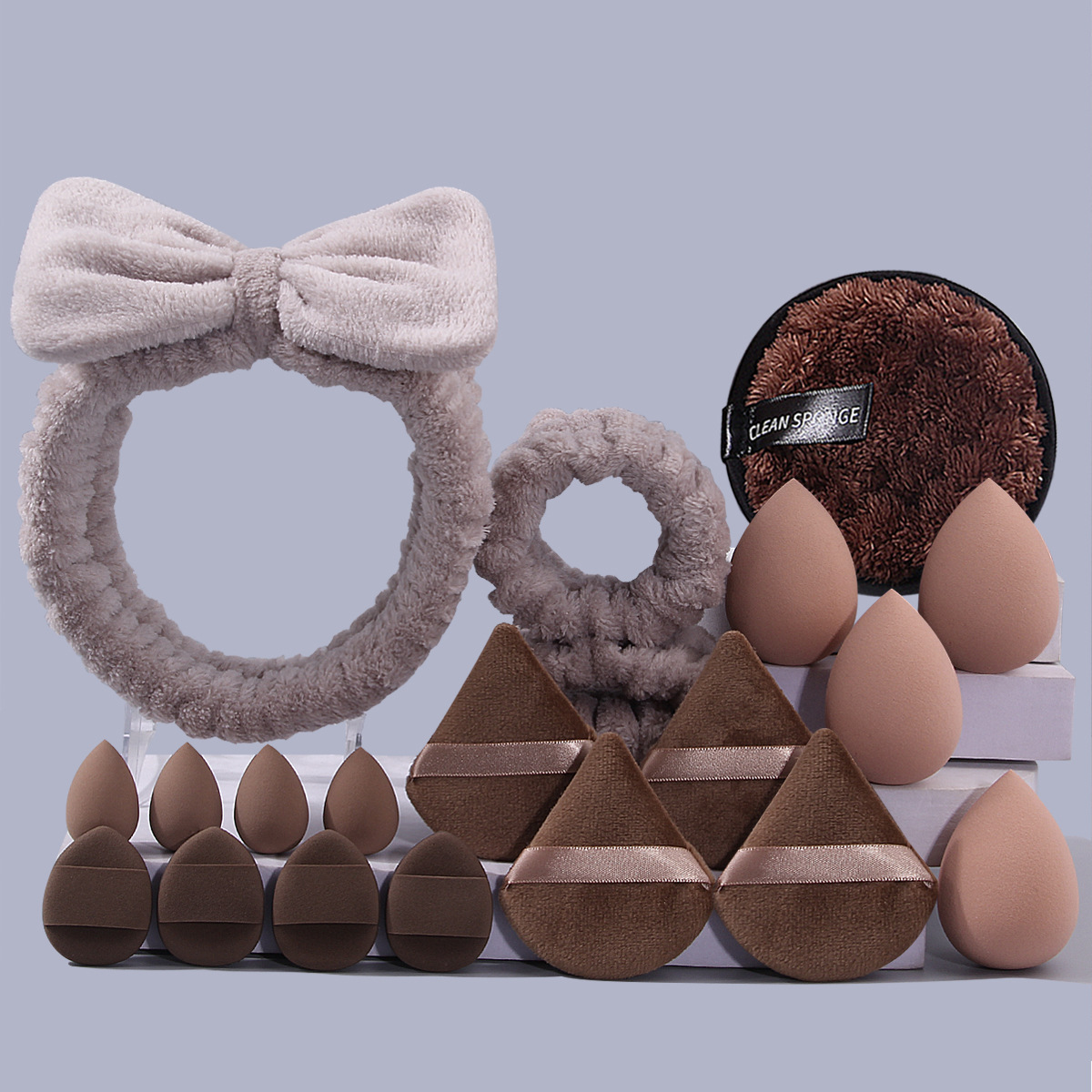 Explosiones transfronterizas desmaquillaje triángulo pulgar polvo conjunto correa de cabello combinación de huevo de maquillaje lavado de la cara esponja absorción correa de muñeca