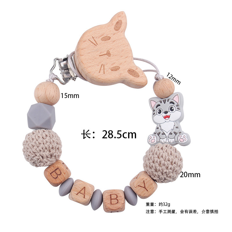 Nuevo bebé gato clip de chupeta de madera de haya dibujos animados juguetes de silicona para gatos calmar bebés chupeta cadena anti-caída cadena