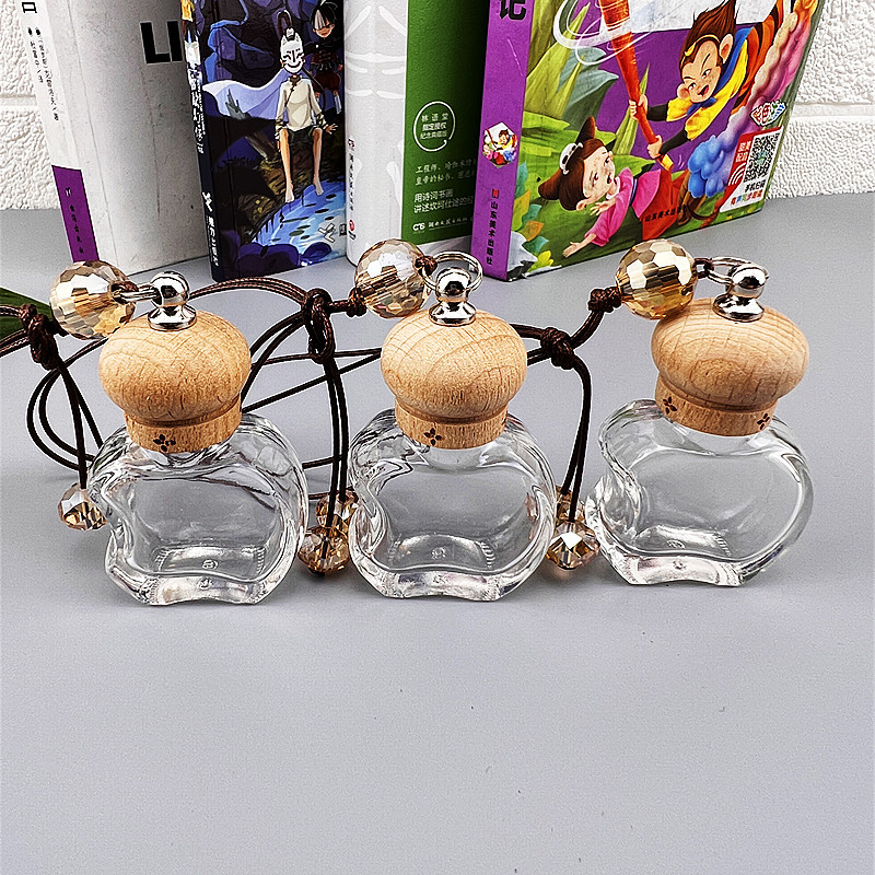 汽车内饰挂件车载出风口香薰瓶苹果形水晶香水瓶玻璃分装空瓶内饰