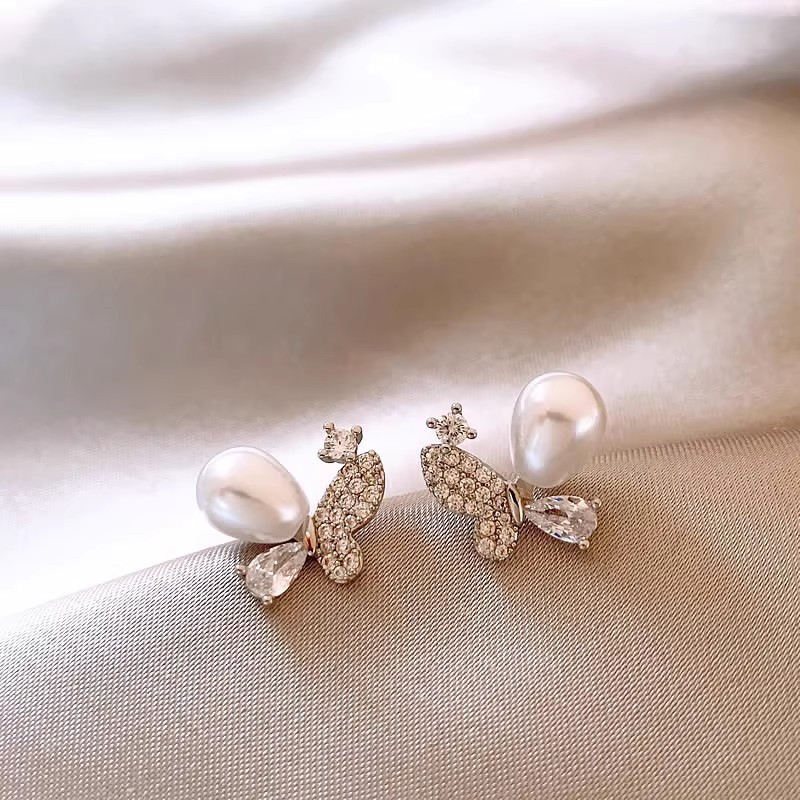 Pendientes de flor con perla y aguja de plata, estilo elegante y retro