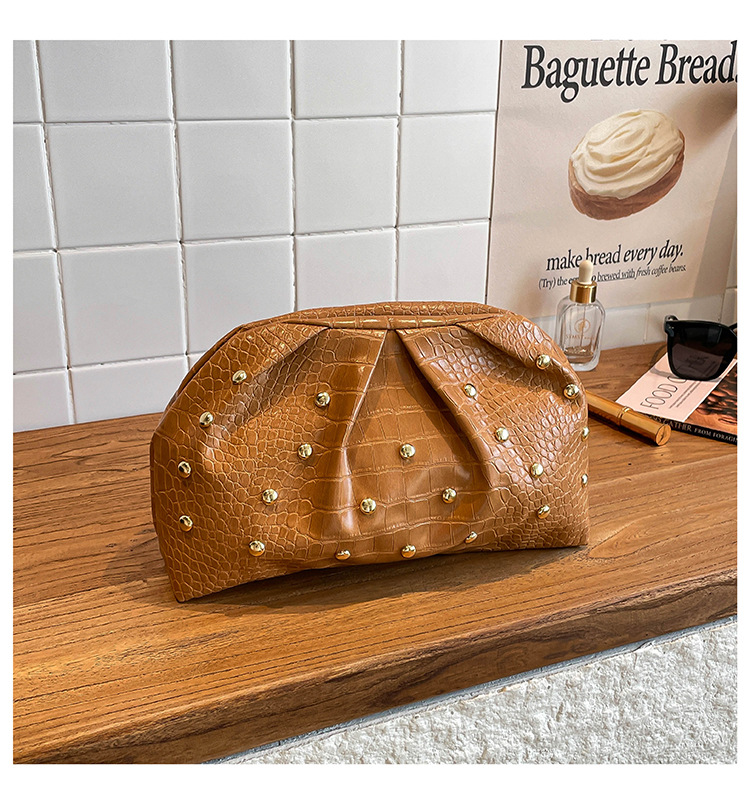 Nueva moda simple versátil de tendencia transfronteriza hombro de un solo clip de brazo de clavos de hongos plegados bolsos de mano bolsos de mujer