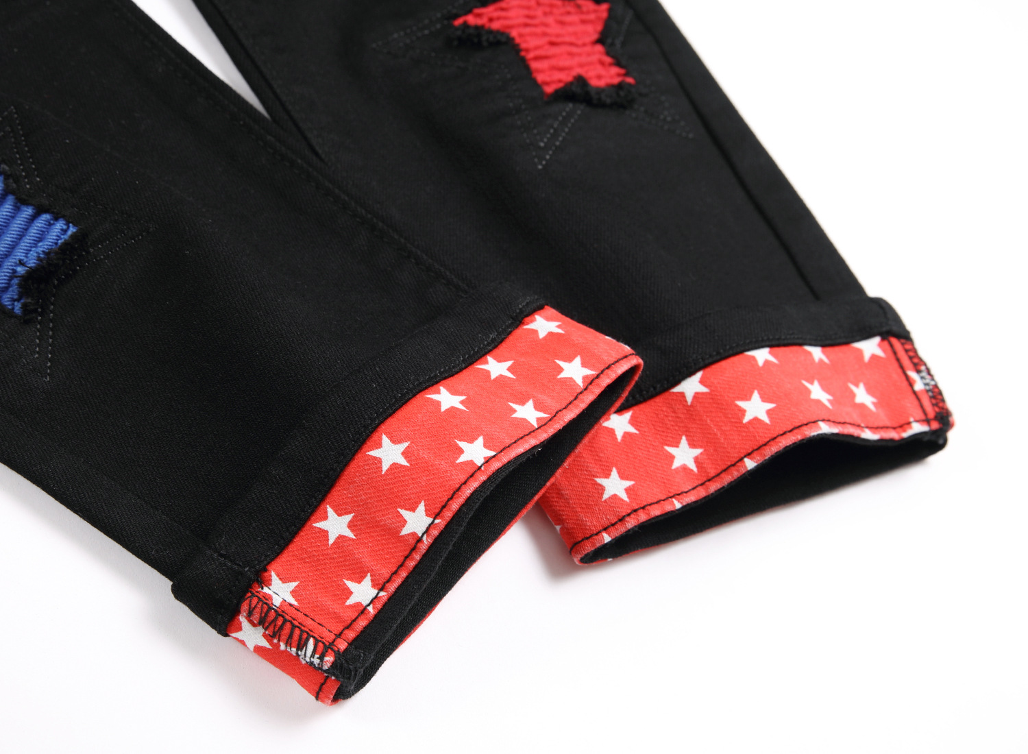Jeans slim fit da uomo con ricami e tessuto denim elastico_voghion.com