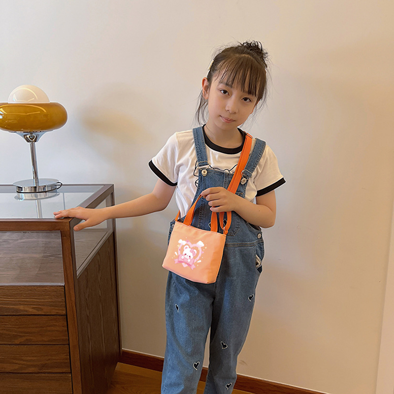 Cartoon bear, bolsas de hombro para niños y niñas, impresión de aire extranjero, bolsas de mano para bebés dulces, bolsas para niños 2025 nuevas bolsas para niños