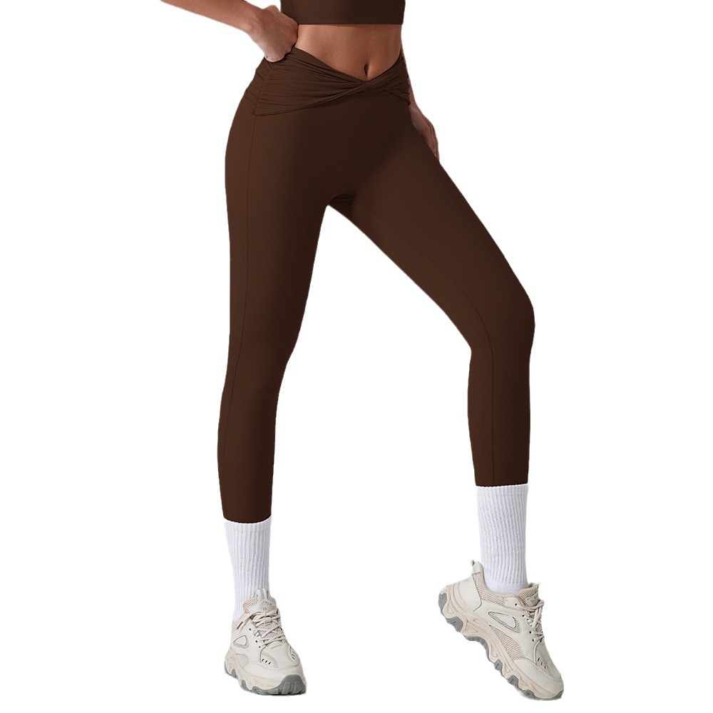 Europa y los Estados Unidos nuevos pantalones apretados rápidos y secos para mujeres torcer cintura alta y caderas pantalones deportivos para correr