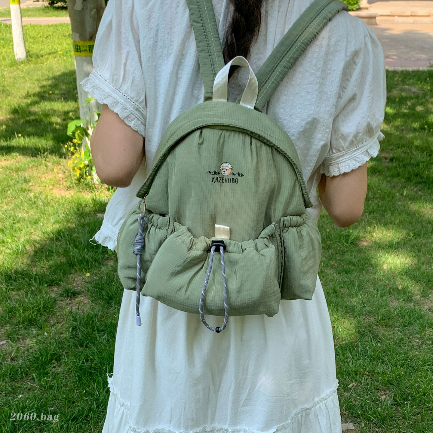 Nuevo estilo de viaje 2026 Bundokou mujer mochila funcional ocio impermeable cuerda de extracción al aire libre mochila de montaña de viento ligera