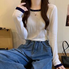 レトロな衝突色2025丸首春夏の新型の薄い韓国版の底のブラウスの長袖のニットの透かし彫りの上着の女性
