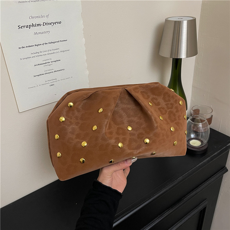 Plegado de tendencia punto de onda de otoño invierno bolso de mano femenino bolso de cena de alta calidad ocio