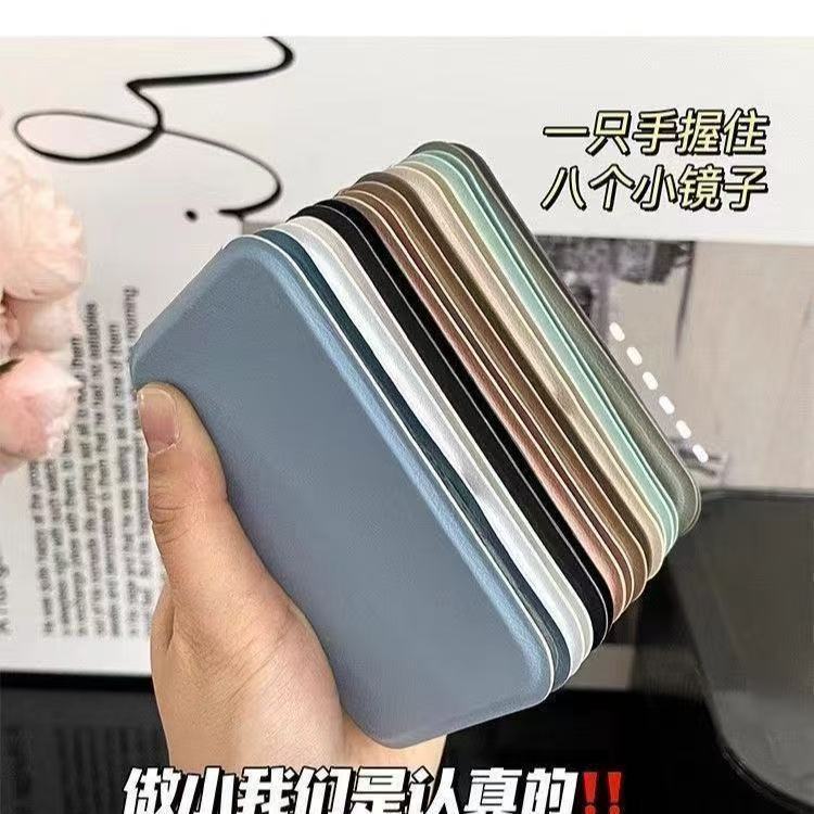 Espejo pequeño portátil para mujeres portátiles de mano dormitorio de escritorio puede ser super mini-estudiante espejo de maquillaje plegable portátil