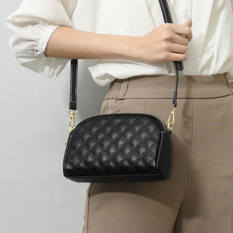 2023 Verano nueva moda crossbody de piel de vaca del todo fósforo Bolso pequeño Bolso transfronterizo del teléfono móvil del cuero genuino bolso de hombro del rombo de las mujeres