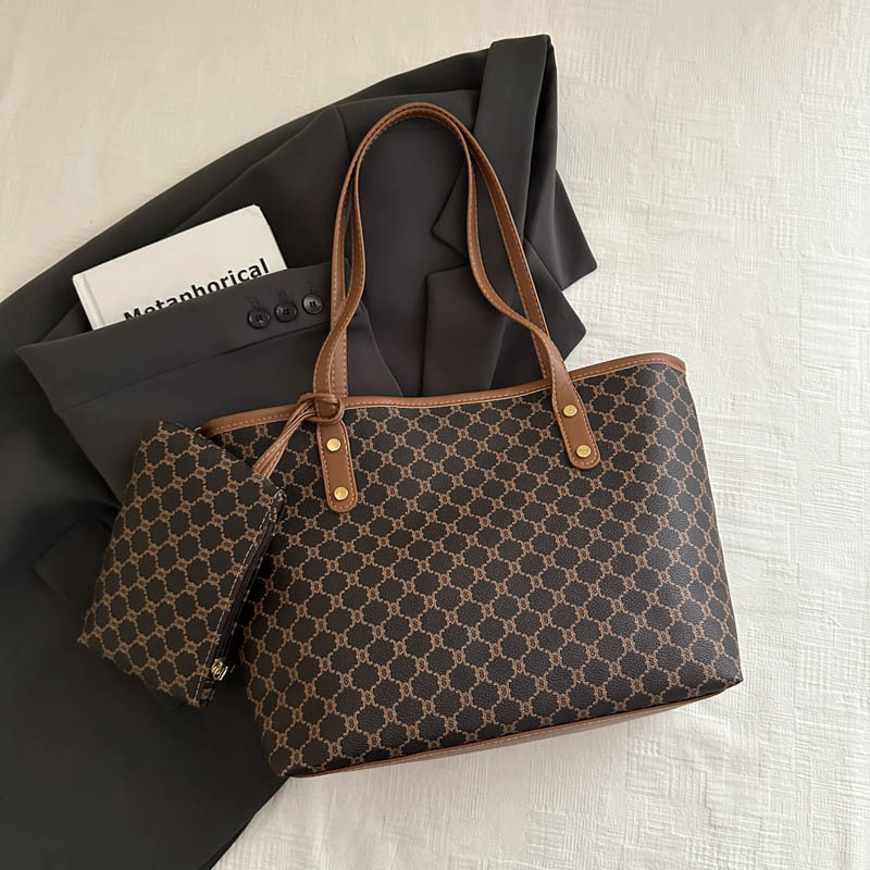 Bolso de alta calidad de gran capacidad 2025 nuevo bolso de viaje de todo fósforo de nicho para mujer bolso de niño de moda para mujer bolso portátil para mujer