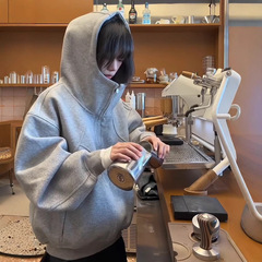 アメリカの重ポンドの郭形のコートの女性のベルベットは秋冬2025の新型の高級感を厚くして帽子の灰色のガーディアンをつなぎ合わせます。