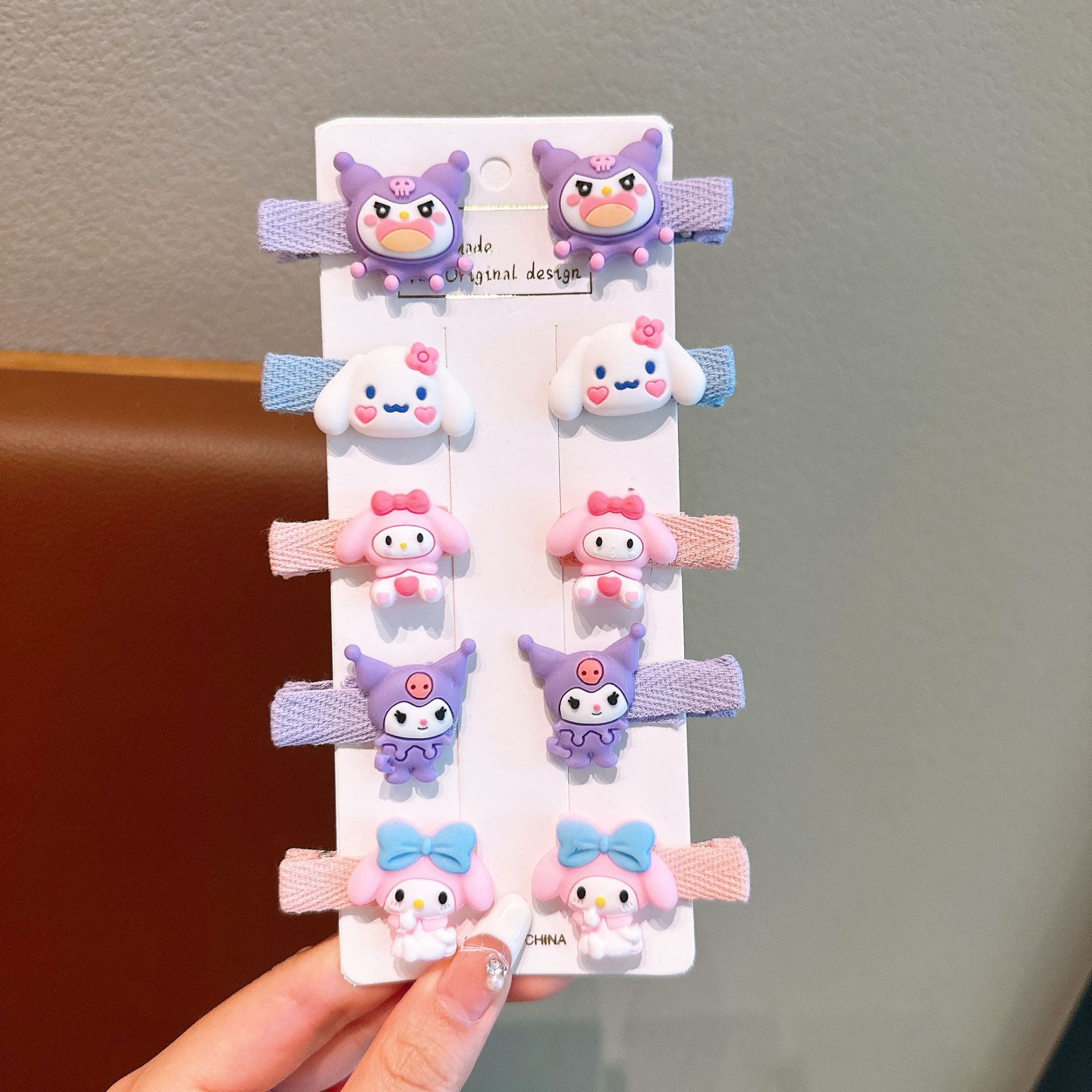 Tombro de bebé femenino Dibujos animados tela todo incluido horquilla para niños 2024 nuevo conjunto de horquillas de gaviota Sanli accesorios para el cabello