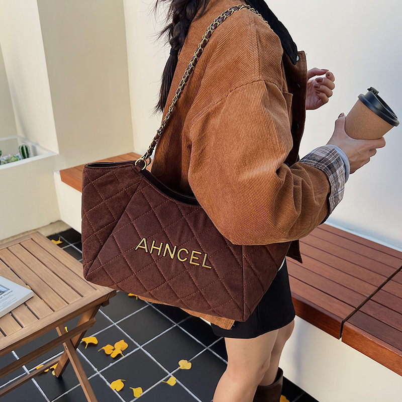 Bolsa de cadena de diamante transfronteriza bolsa de gran capacidad bolsa tote para mujeres otoño y invierno 2025 nueva bolsa de hombro de viaje de mano bolsa de brazo