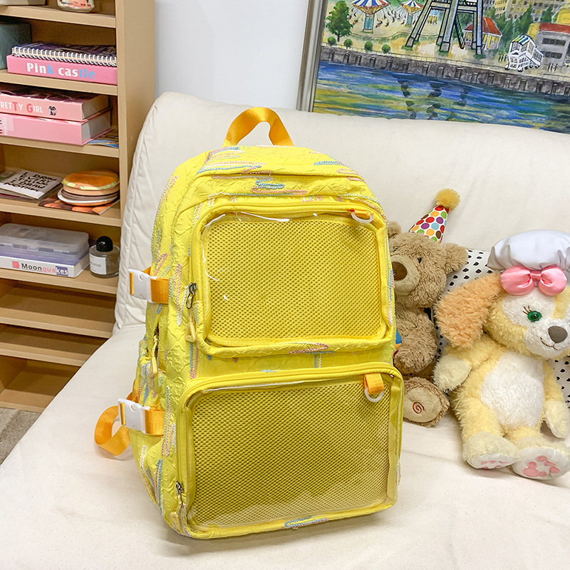 En la nueva mochila femenina 2025, la nueva chica tiene una gran capacidad de dibujos animados, estudiantes de secundaria, mochilas llenas de bolsos portátiles.