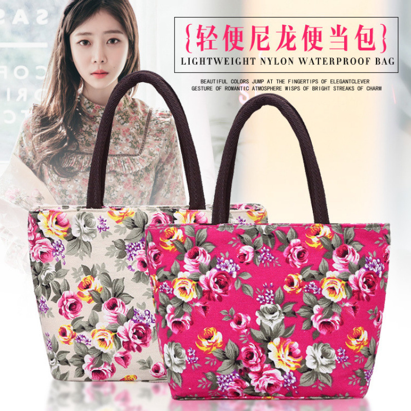 Nuevo bolso de moda casual de impresión de rosa bolso de lona de aire extranjero bolso portátil de viajes de mediana edad