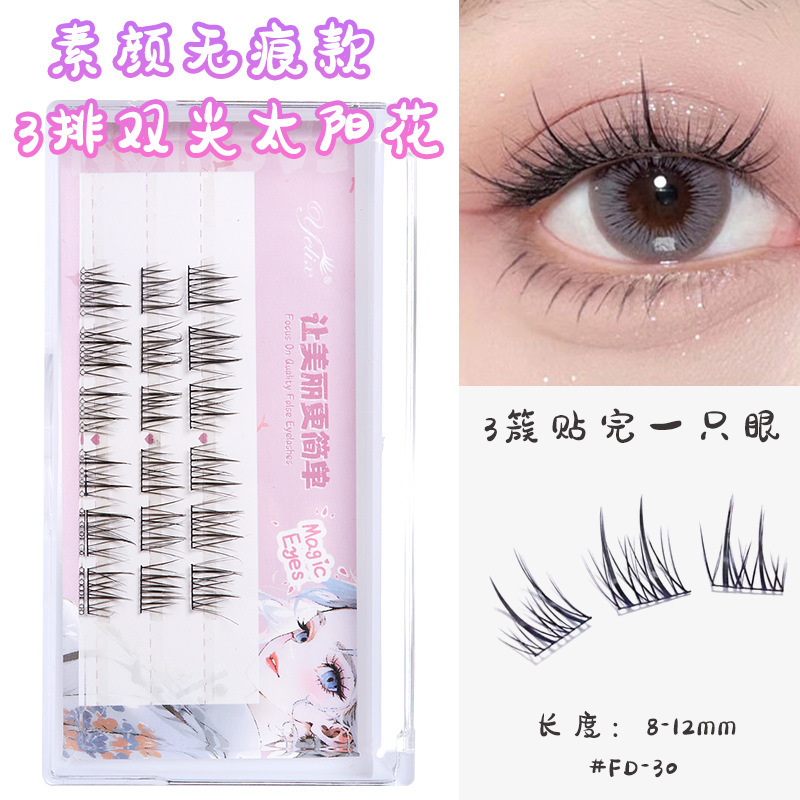 Fábrica de pestañas de espilla de trigo doble punta al por mayor pestañas falsas duras flores de sol naturales densas cómic pestañas sin cola