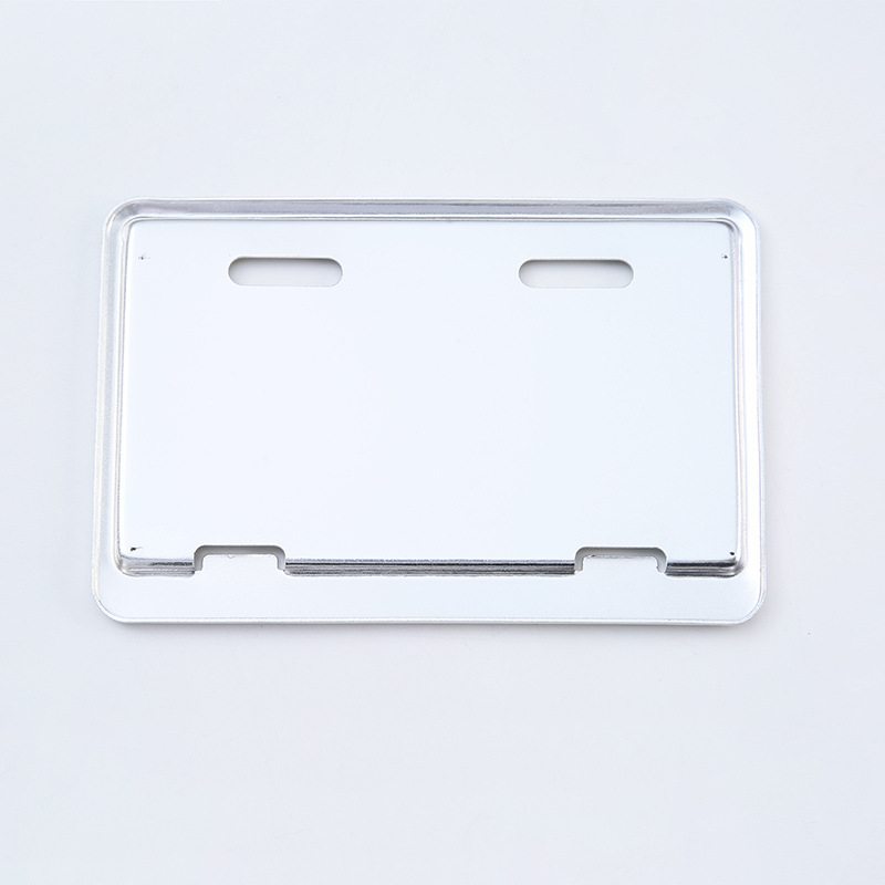 Suministro directo de fábrica Marco de placa de licencia de coche de fibra de carbono de imitación Marco de placa de licencia de aleación de aluminio universal LOGO Marco de placa de licencia de pantalla de seda