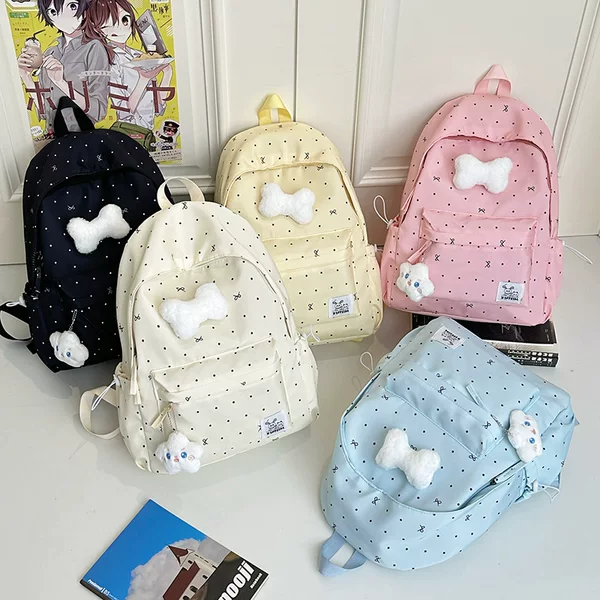 Cross-border wholesale school backpacks for junior high and high school students, girly polka dot bow versatile high-appearance female student backpack