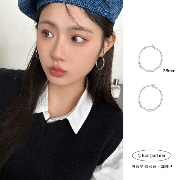 Silver trumpet earrings