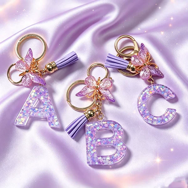 Cross-border A-Z purple glitter letter keychain with butterfly tassel, a creative accessory for bags