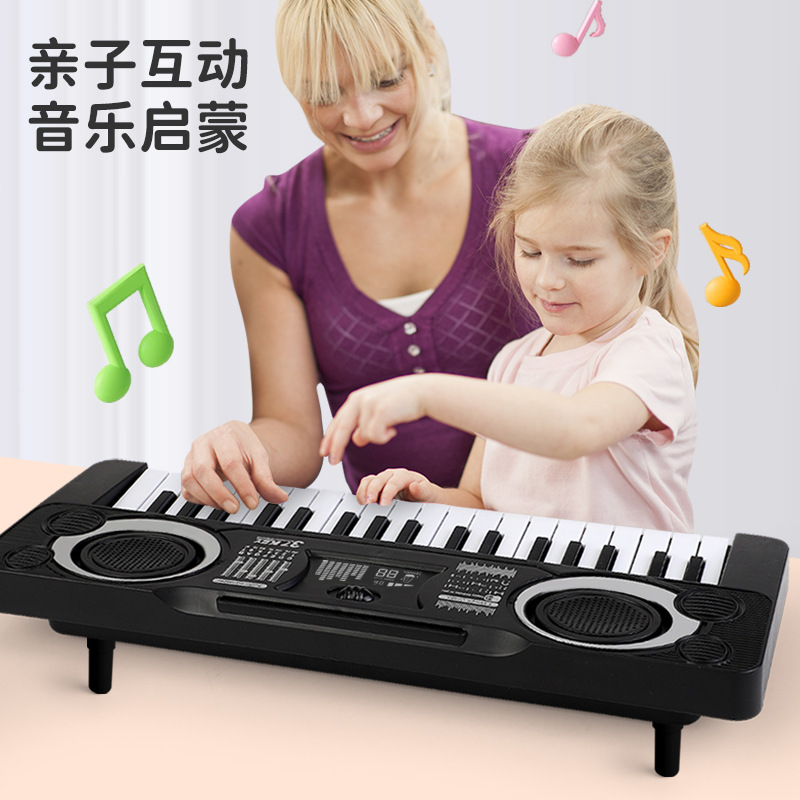 Children's multi-functional toy electronic keyboard imitates a piano, allowing for practice, early education, and intellectual development.