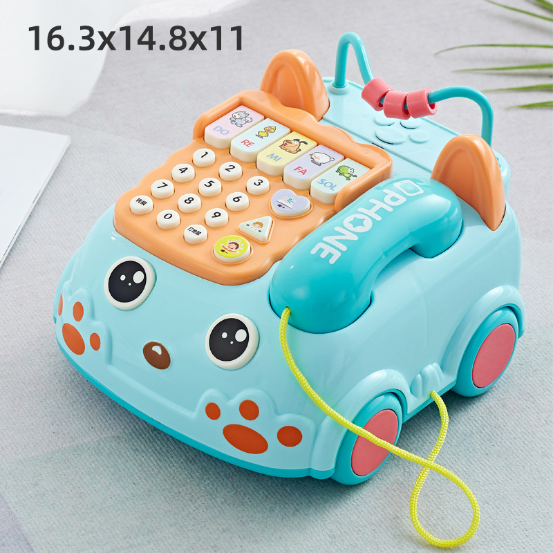 Teléfono multifuncional infantil historia de música simulación de teléfono fijo bebé iluminación yizhi educación temprana juguetes al por mayor para niñas