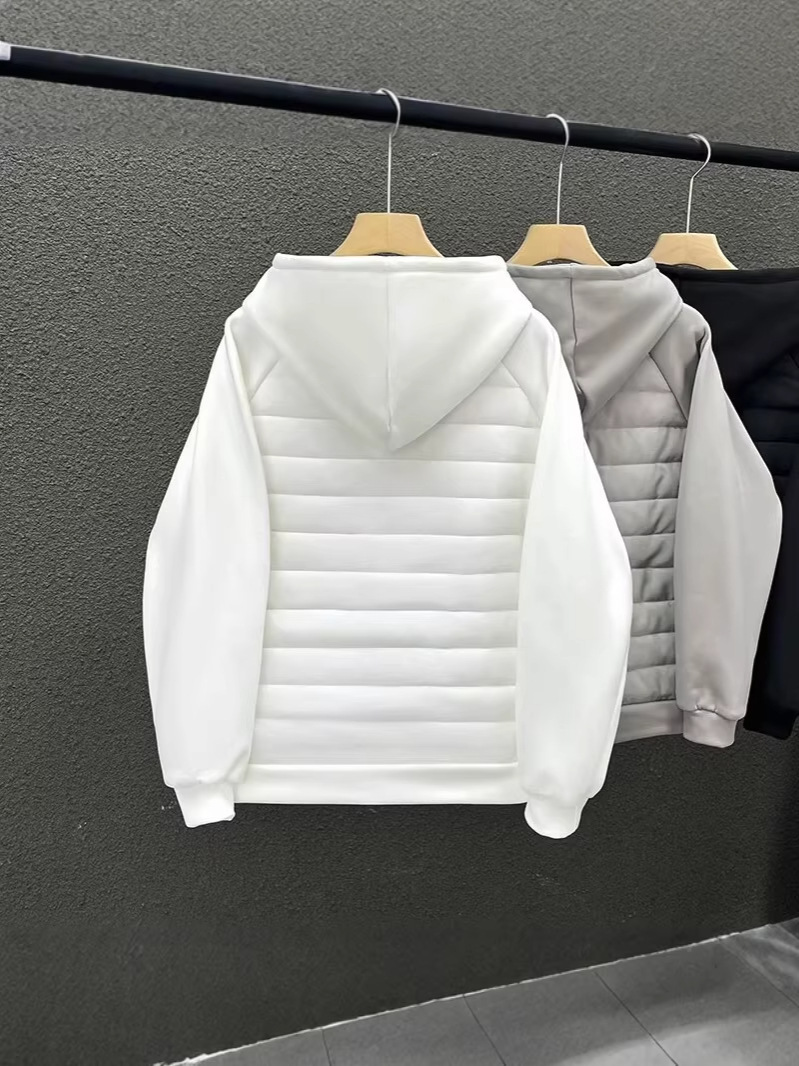 Fuente de fábrica de tendencia ligera de algodón hombre comercio exterior relajado casualidad con sombrero de color sólido empalme pareja chaqueta hombre