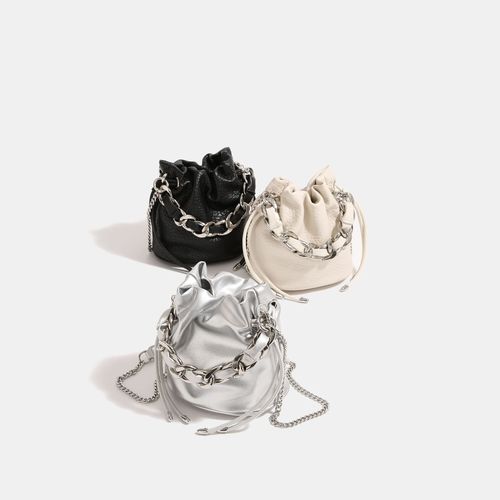 银色流浪编织链条水桶包2024新款女小众高级感手提斜挎小包单肩包