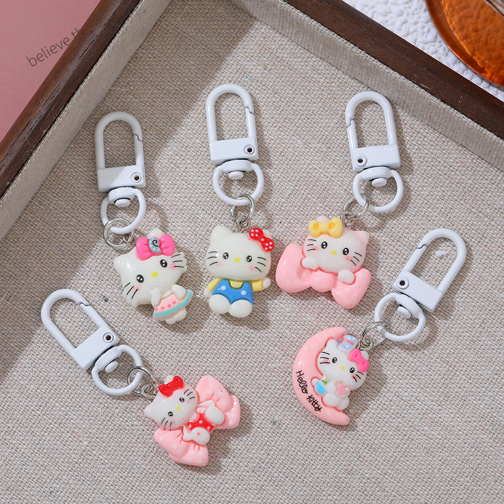 Cartoon Moon Cat DIY accesorios de resina llaveros Sanrio arco gato bolsas colgantes de chicas
